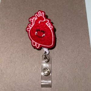Heart badge reel